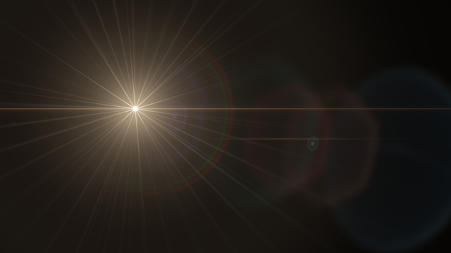 A bright stage-inspired flare with radiating light.