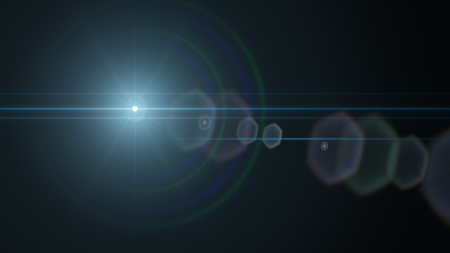 Electric blue streaks with prismatic rings and polygonal reflections.